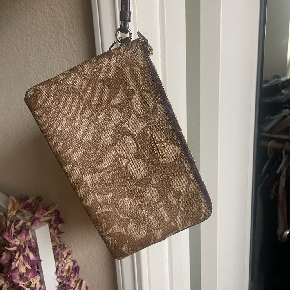 COACH wristlet, learher, dark brown and beige color, two big pockets with zipper